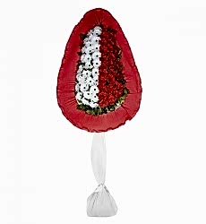 Beyaz ve kırmızı yapay gerbera ile hazırlanmış tek katlı açılış ve düğün çiçeği.
